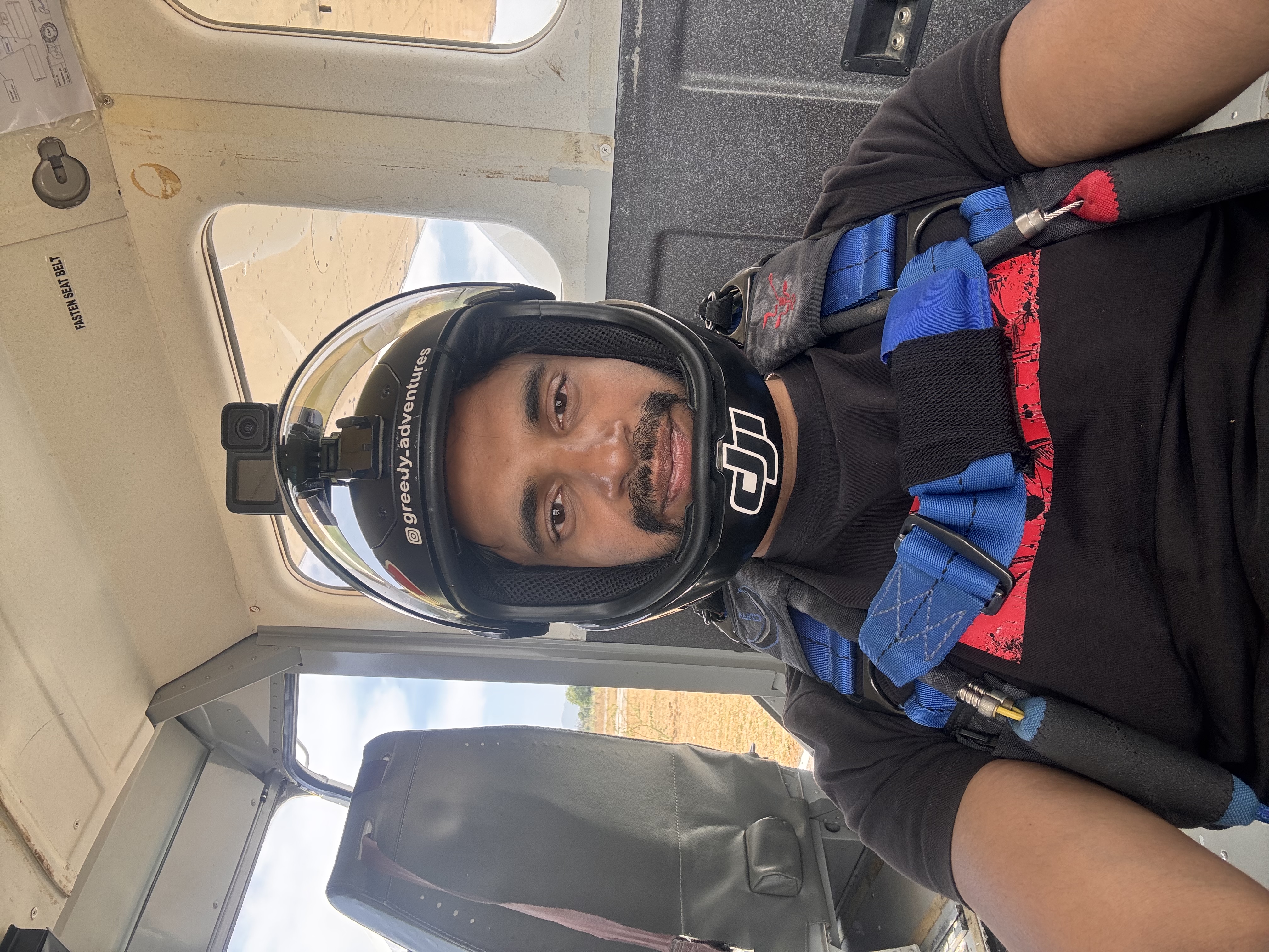 Anubhav in helmet and harness inside the Skydive India aircraft